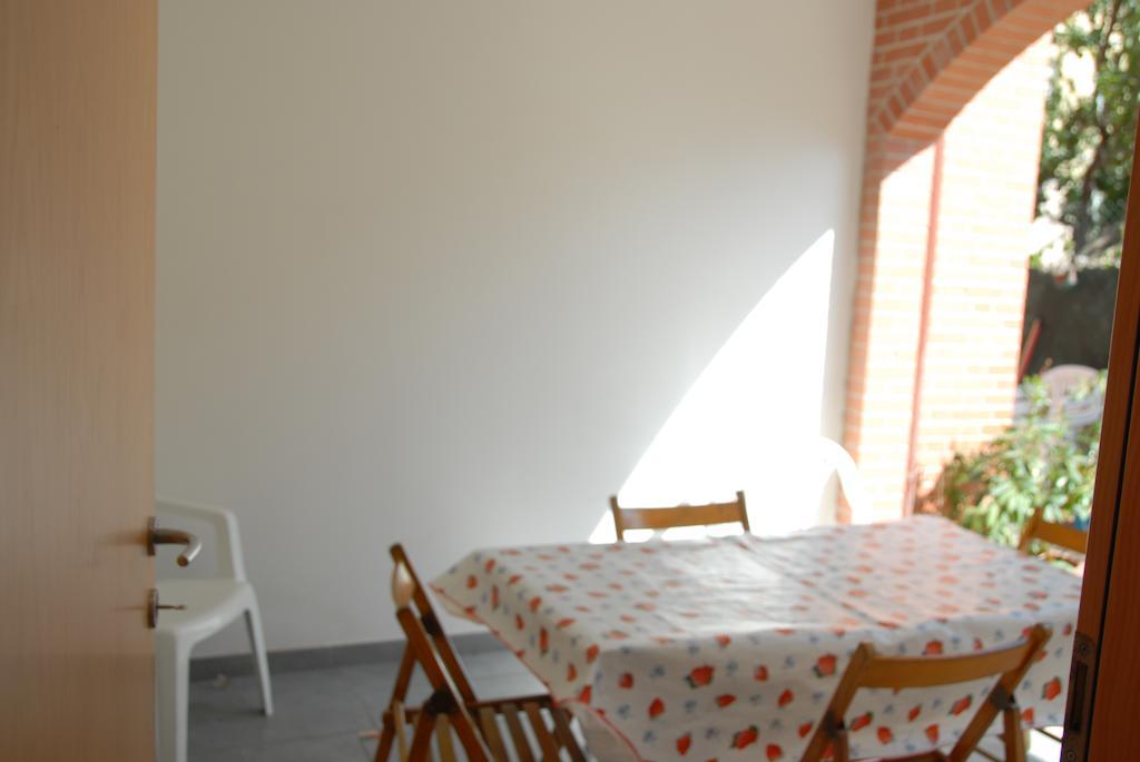 I Portici Appartamenti Marina di Grosseto Szoba fotó