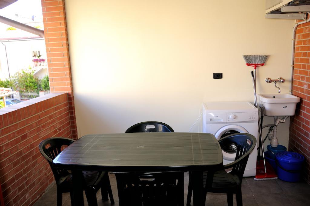 I Portici Appartamenti Marina di Grosseto Szoba fotó