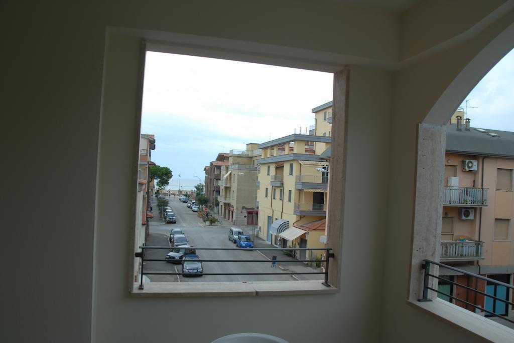 I Portici Appartamenti Marina di Grosseto Szoba fotó