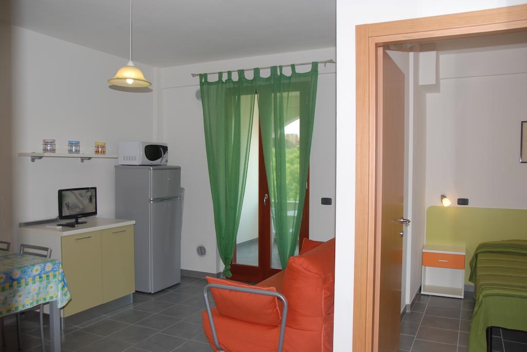I Portici Appartamenti Marina di Grosseto Szoba fotó